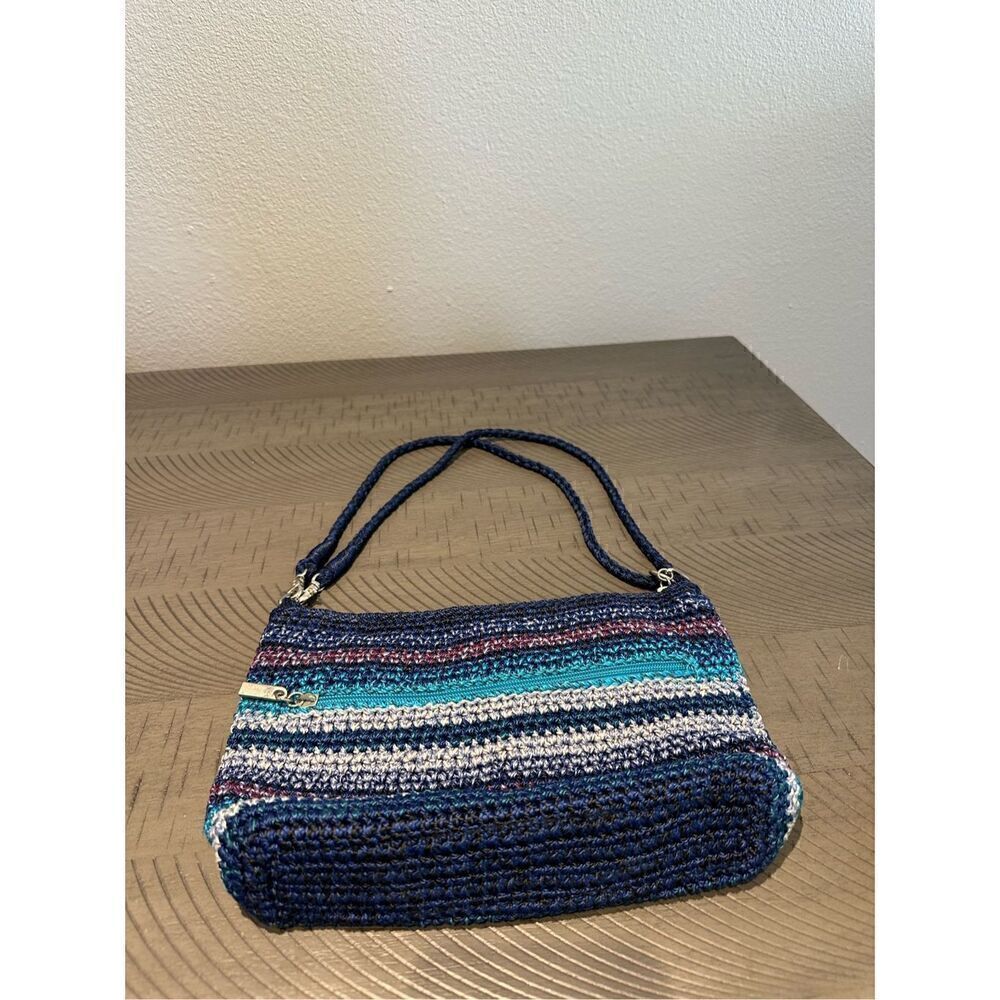 The Sak Hand Bag in beautiful Blue and Purple .  Measures 11 x 7.   21” handle